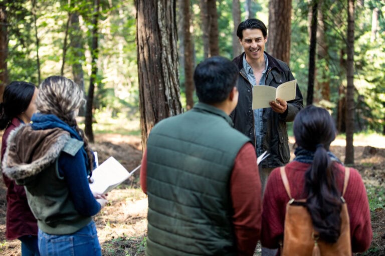 Family and friends gathered at a Forest Memorial ceremony sharing readings
