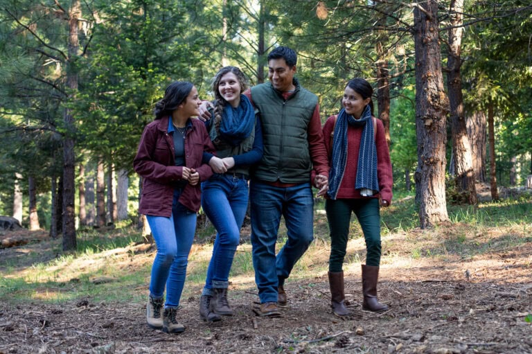 Family walking in a Memorial Forest going to a Forest Memorial