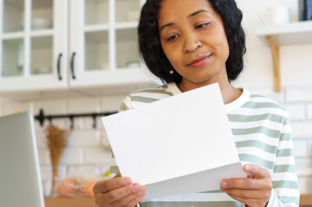 Woman reading a sympathy card