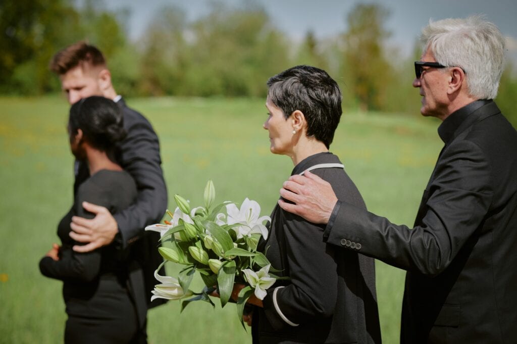 mourners gather for a death vigil