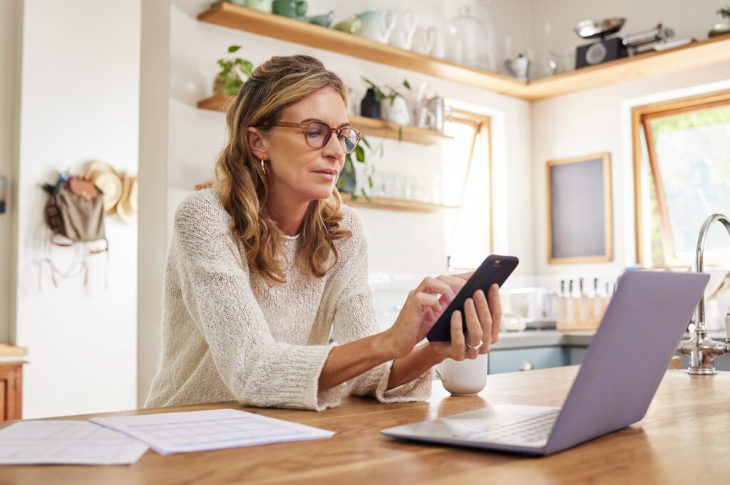 A woman reads through a checklist for essential steps for afterlife care