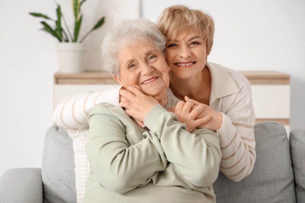 An elderly woman and her daughter