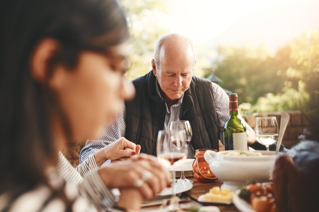 A large group of people gathering to celebrate the life of a loved one