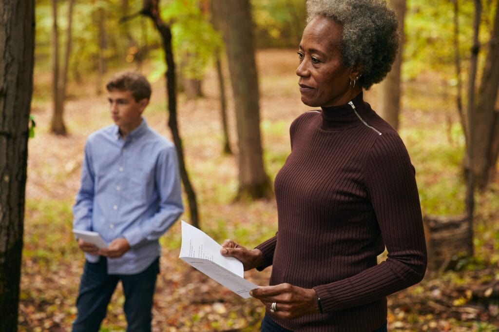 Woman leading a nature based memorial