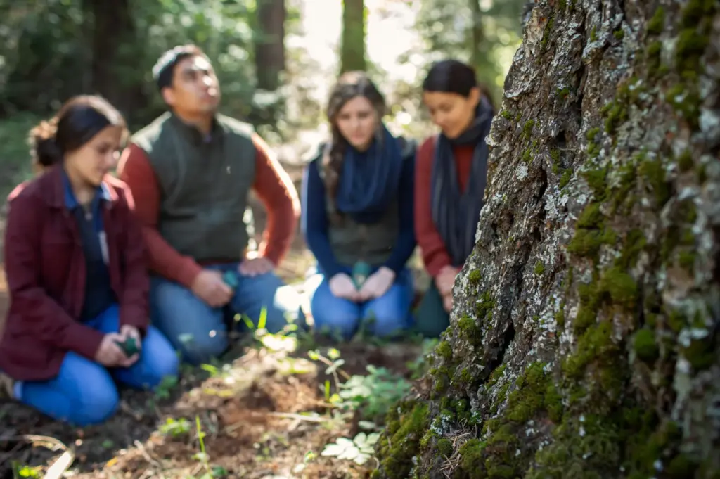 A family scatters ashes of a loved one in a National Park