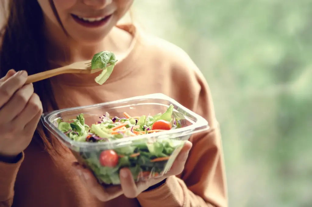A son supports his grieving father during dinner