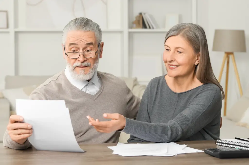 Elderly couple planning ahead for their cremation needs