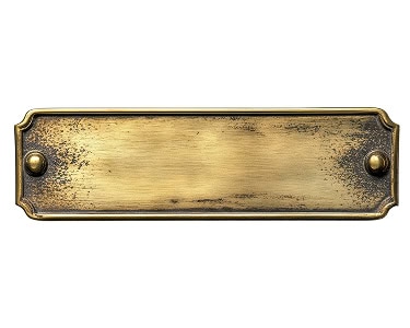 Close-up of a silhouetted conventional memorial tree plaque.